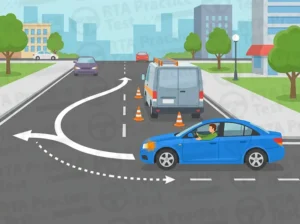If your intended lane is blocked by stationary vehicles, you should: